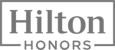 The image shows the Hilton Honors logo, featuring stylized text within a rectangular border.